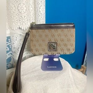 Dooney & Bourke monogram canvas wristlet 3.5 in H x 5.5 in L